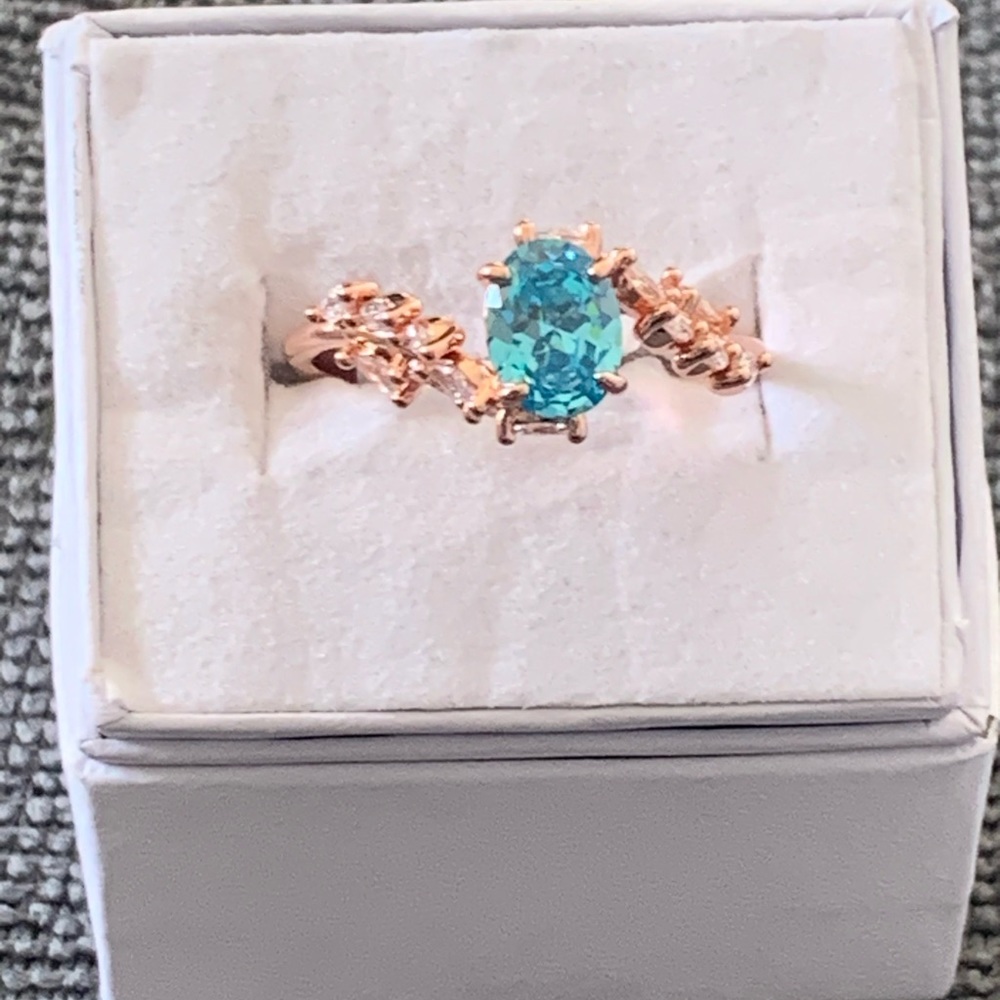 Bomb Party Aqua Blue Cubic Zirconia on rose gold plating